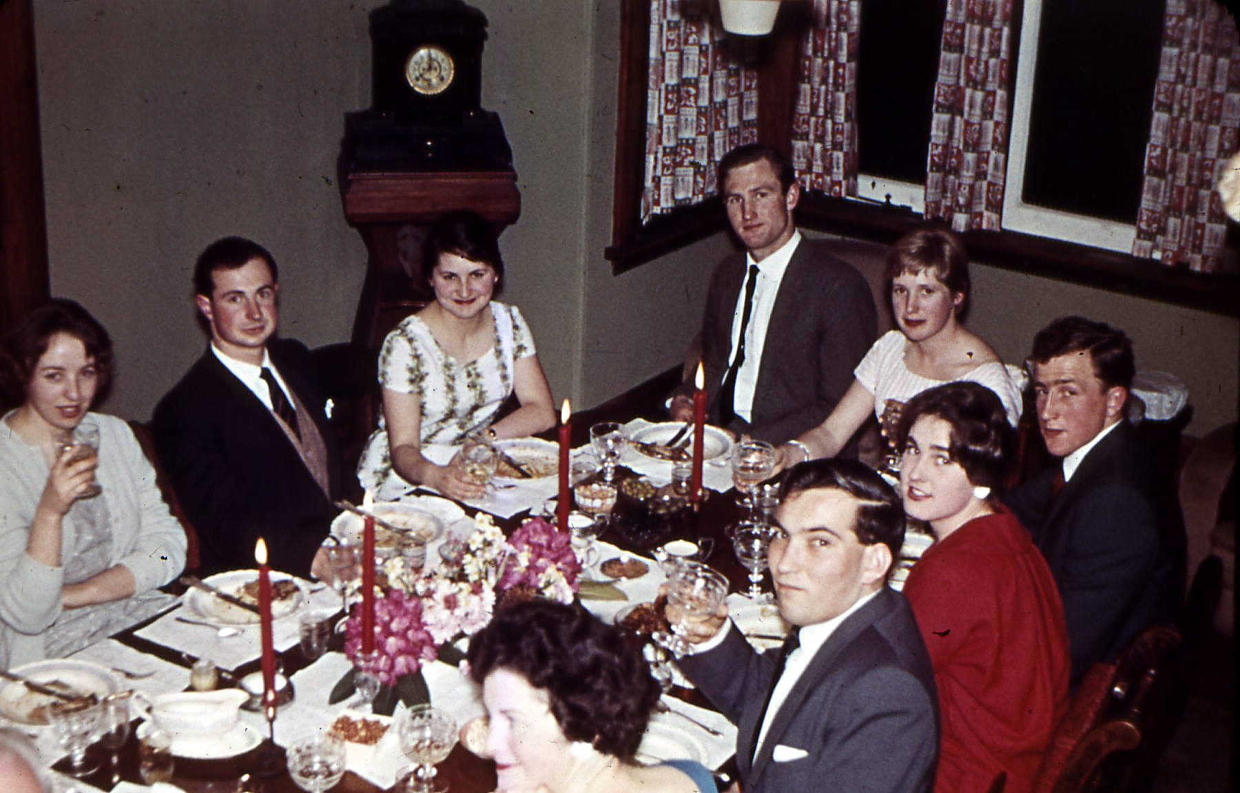 Dinner party at Toad Hall. [eLeft -right] Guest, Fred Strange, guest, John Allan, guest, Lachie Watson, guest, George Salmond. Jim Scott Collection.